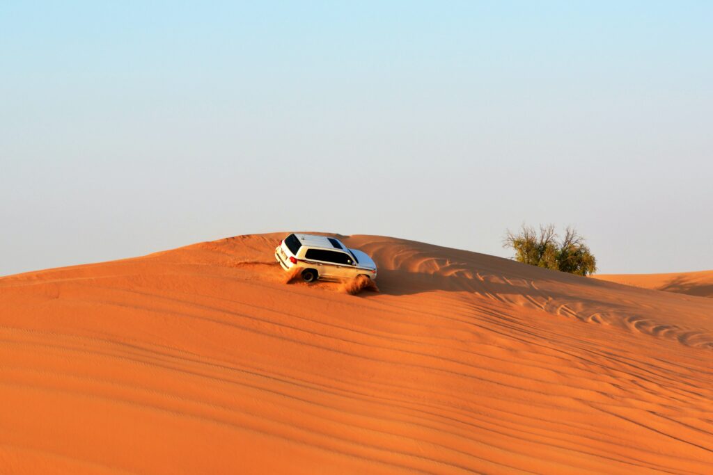 Car Being Drifted on Desert in Dubai